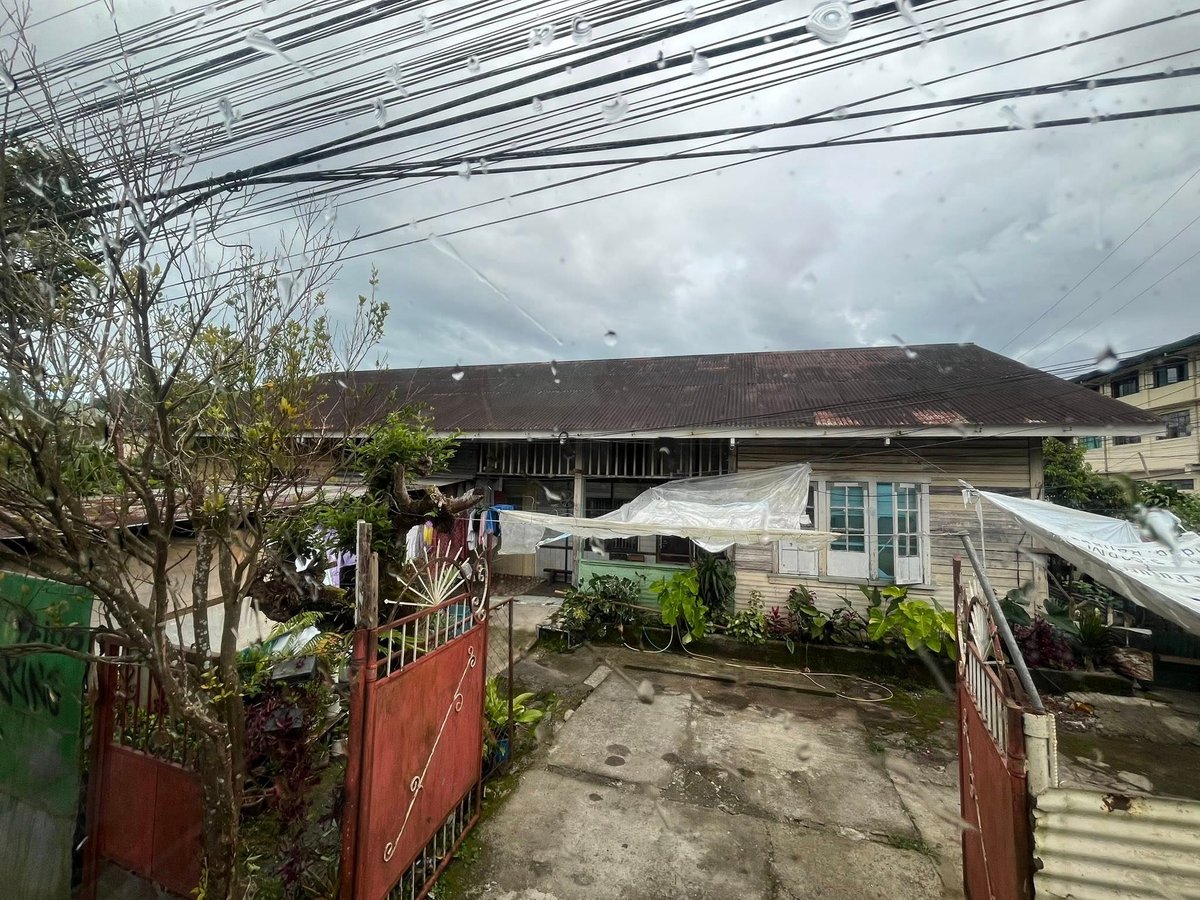 AN American-era wooden cottage still used as staff housing, preserving early 20th-century Cordillera architectural character.