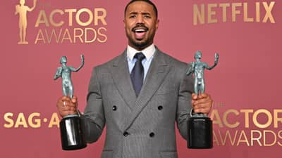 US actor Michael B. Jordan poses with the awards for Outstanding Performance by a Male Actor in a Leading Role and Outstanding Performance by a Cast in a Motion Picture for "Sinners" during the 32nd Annual Actor Awards at the Shrine Auditorium in Los Angeles on 1 March, 2026.