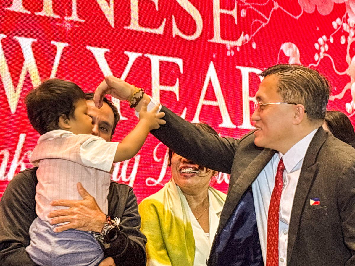 NIECO Vince Vasquez receives a blessing from Senator Bong Go.