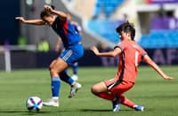 ANGIE Beard (left) of the Philippines controls ball possession over Kim Shin-ji of South Korea during their AFC Women’s Asia Cup encounter on Thursday. The Koreans won, 3-0.