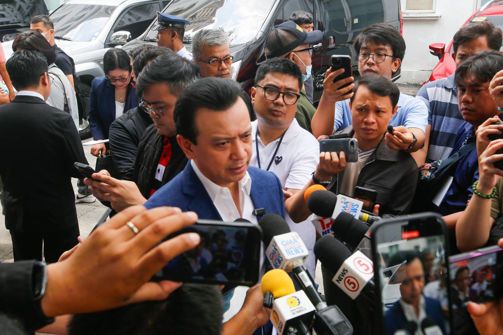 Former Senator Antonio Trillanes IV arrives at the Department of Justice in Manila on  05 March 2026, to file cyberlibel and perjury complaints against lawyer Levi Baligod and 18 "ex-marines." The complaints stem from allegations of a bribery scheme involving ICC investigators. Also named in the filing are Mike Defensor, Jay Sonza, Lorraine Badoy, and Cathy Binag for their alleged roles in spreading the claims.
