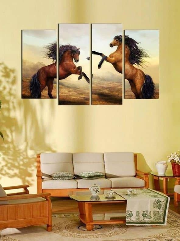 MINIMALIST wall featuring running horse artwork in a neutral palette.