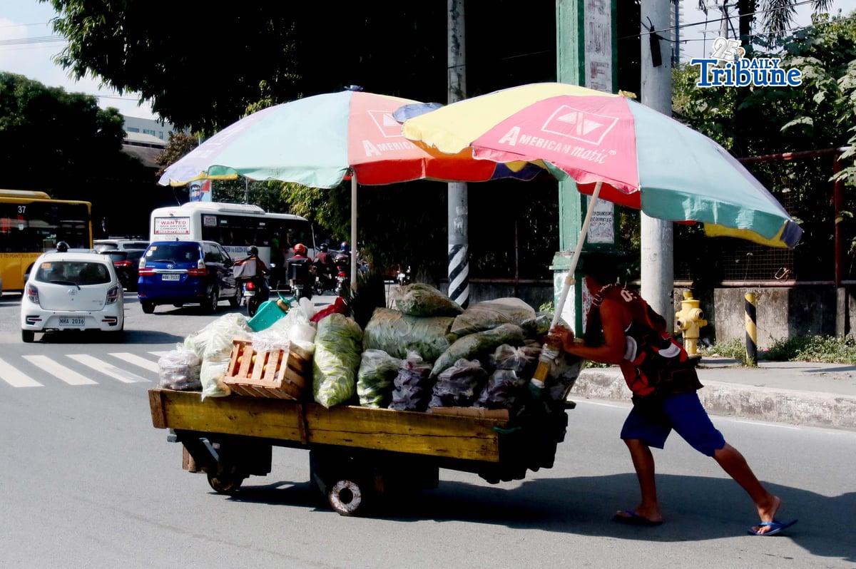 (March 06 2026) A man pushing a cart loaded with vegetables passing along Quezon avenue in Quezon City on Friday March 6 2026. The country's Inflation accelerated to 2.4% in February, the fastest in 13 months, according to data released by the Philippine Statistics Authority (PSA) on Thursday, which is 0.4 percentage points higher than January's 2.0% and slightly above the 2.1% recorded in February 2025. Photo/Analy Labor