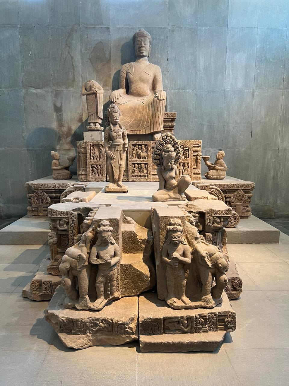 A COLLECTION of sandstone carvings.