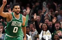 JAYSON Tatum celebrates scoring in Boston's win over Dallas after making his first start since suffering an Achilles injury 10 months ago