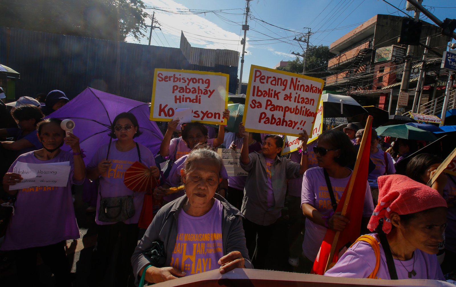 Women's rights advocates gather at Mendiola, Manila, on Saturday morning, ahead of International Women's Day, to call for decent housing for all, an end to corruption, and the demilitarization of rural areas.
