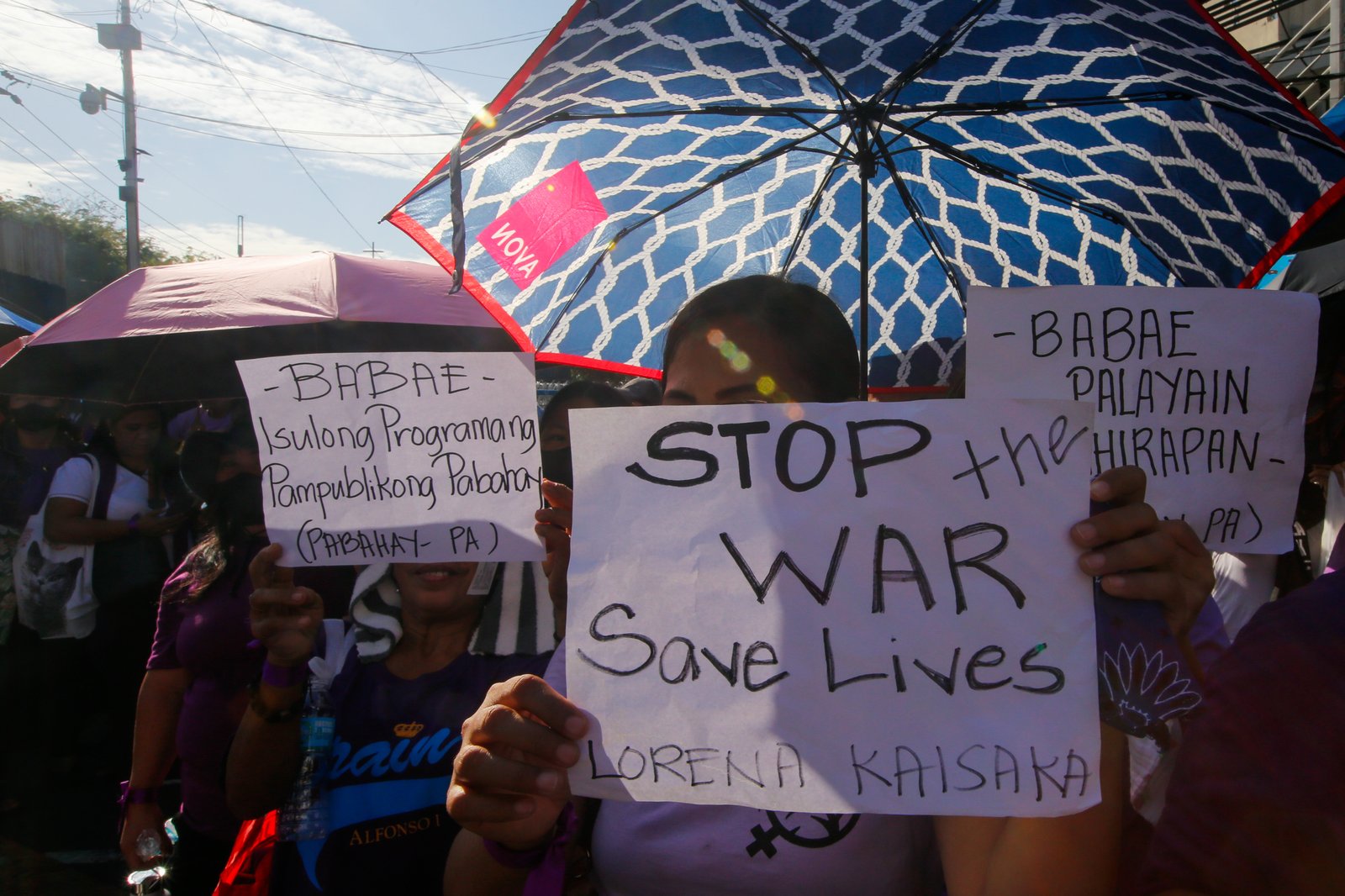 Women's rights advocates gather at Mendiola, Manila, on Saturday morning, ahead of International Women's Day, to call for decent housing for all, an end to corruption, and the demilitarization of rural areas.