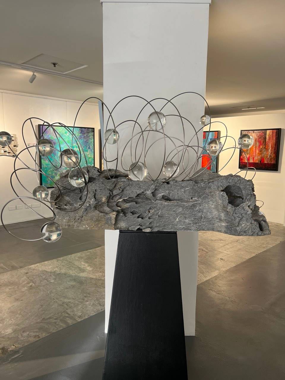 ASTRA Gratia III, Impy Pilapil, 2025, stone, steel and glass.