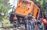 PHILIPPINE National Railways workers clear a derailed train near Don Bosco in Makati in 2023 — a moment frozen on steel and gravel months before the old line fell silent in 2024 for the North-South Commuter Railway expansion, a project that has itself lost momentum.
