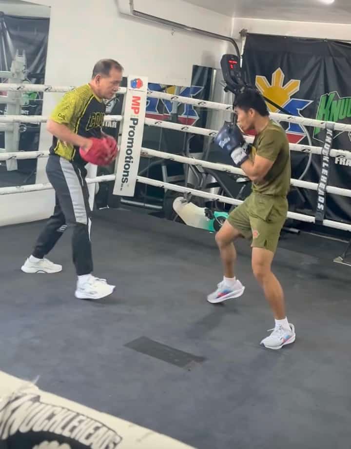 WORLD champion Pedro Taduran (right) and chief trainer Carl Peñalosa Jr. ramp up their training camp in Las Vegas.