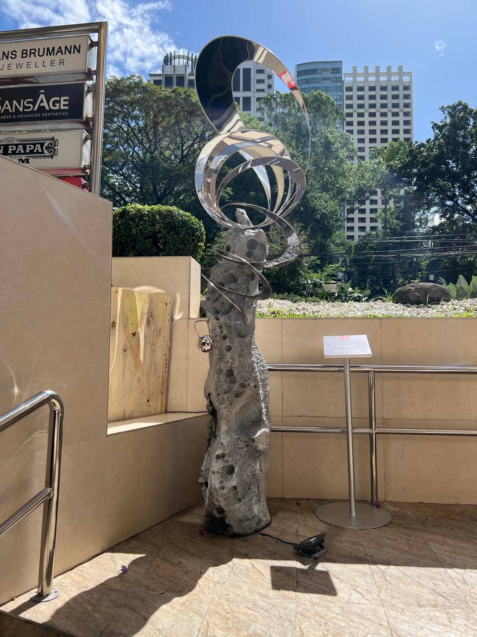 SURGE, Impy Pilapil, 2026, Stone, steel, and glass.