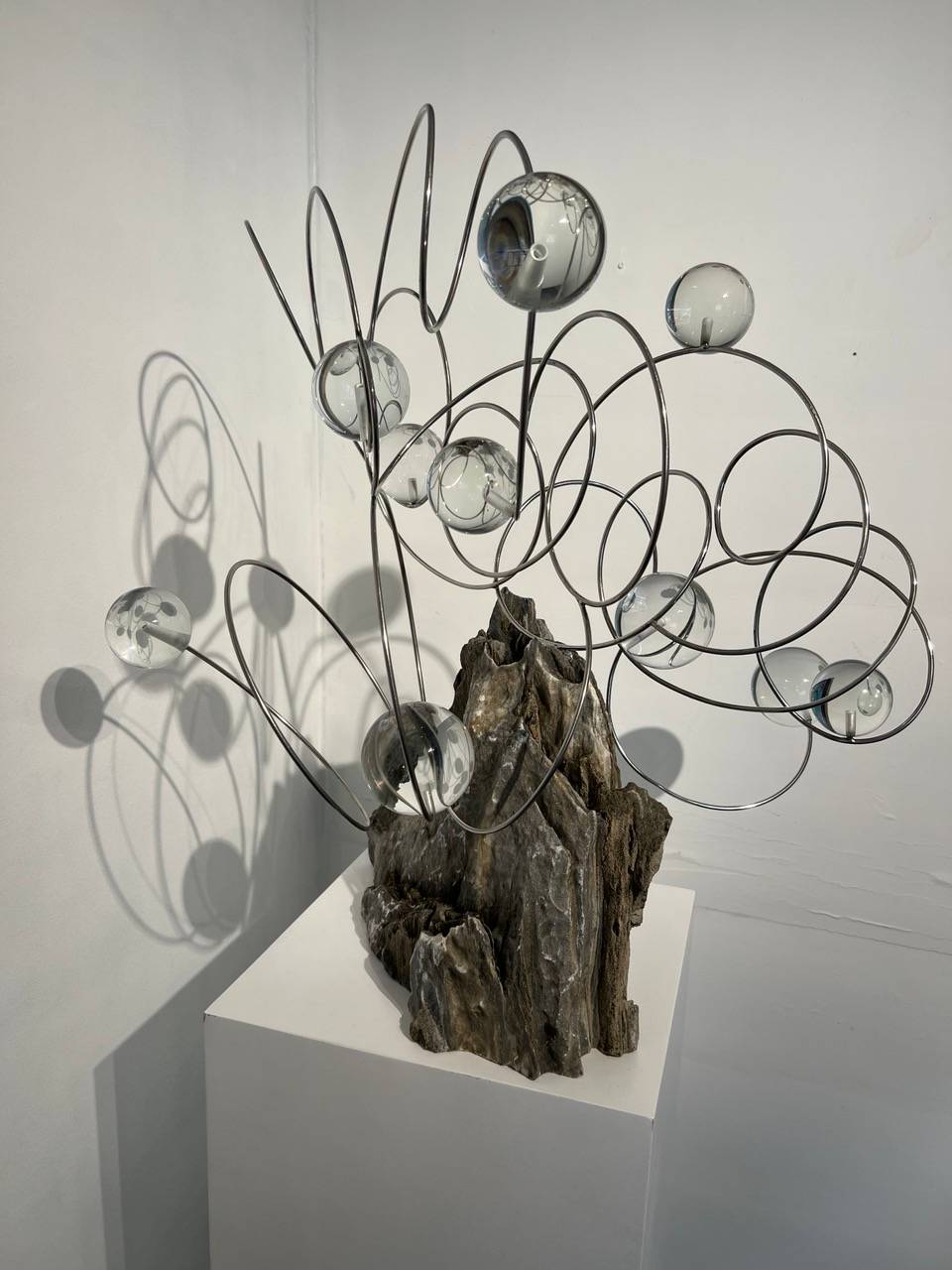 ASTRA Gratia II, Impy Pilapil, 2025, stone, steel and glass.