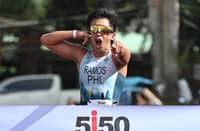 JOSHUA Ramos celebrates after crossing the finish line to rule the Filipino Elite Category at the 5150 Triathlon Guimaras on Sunday.