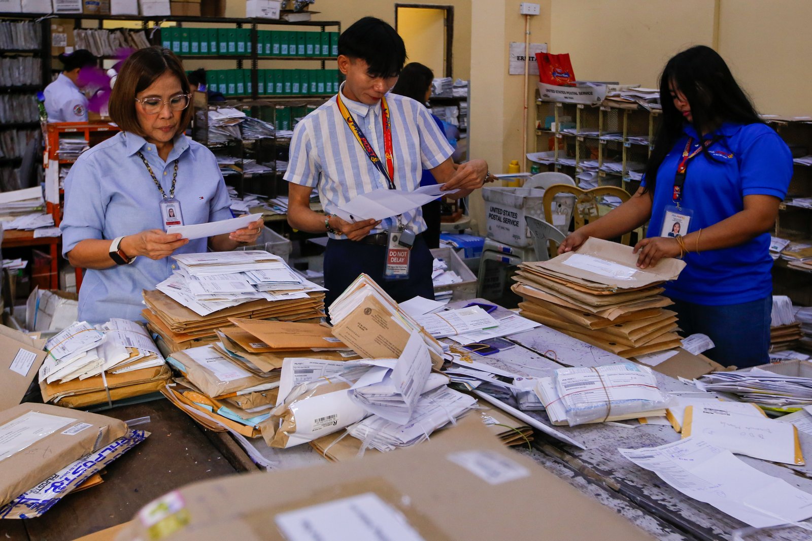 Philippine Postal Corporation (PHLPost) personnel sort mail at the Manila Central Post Office in Liwasang Bonifacio, Manila, on 09 March 2026. The PHLPost is currently implementing a compressed workweek among personnel whose duties cannot be rendered remotely and those in the mail operations to ensure uninterrupted service delivery.