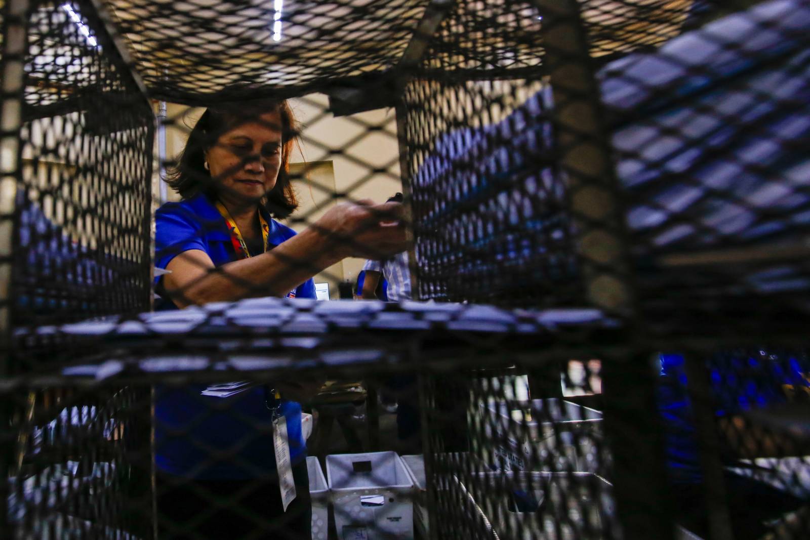 Philippine Postal Corporation (PHLPost) personnel sort mail at the Manila Central Post Office in Liwasang Bonifacio, Manila, on 09 March 2026. The PHLPost is currently implementing a compressed workweek among personnel whose duties cannot be rendered remotely and those in the mail operations to ensure uninterrupted service delivery.