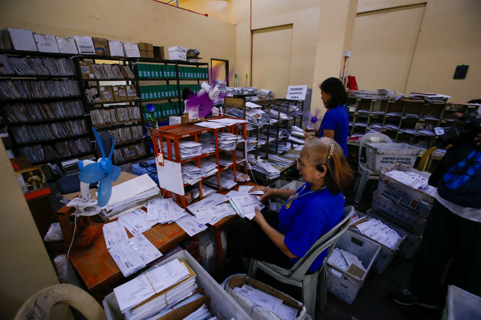Philippine Postal Corporation (PHLPost) personnel sort mail at the Manila Central Post Office in Liwasang Bonifacio, Manila, on 09 March 2026. The PHLPost is currently implementing a compressed workweek among personnel whose duties cannot be rendered remotely and those in the mail operations to ensure uninterrupted service delivery.