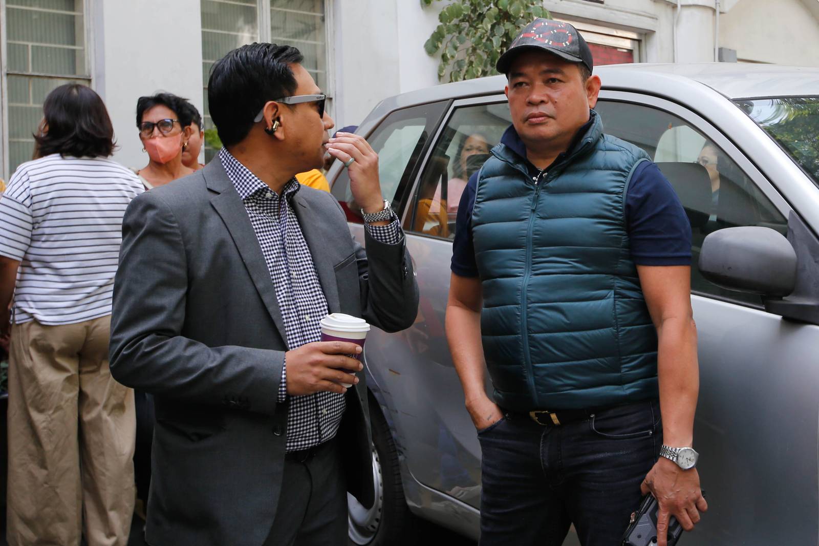Julie "Dondon" Patidongan, a key whistleblower in the missing sabungeros case, arrives at the Department of Justice in Manila today, 09 March 2026. He remained tight-lipped regarding the reason for his visit.