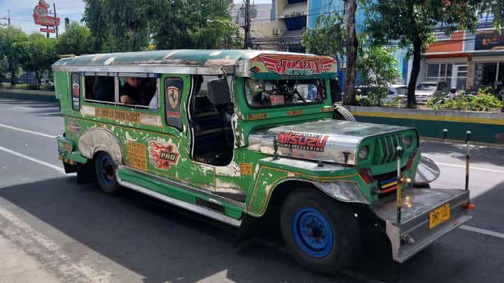 A classic jeepney driving along the route of Sucat to Baclaran in Parañaque.