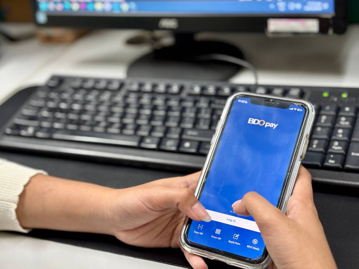 A USER accesses the BDO Pay mobile application on a smartphone, highlighting how digital banking platforms allow Filipinos to transfer funds, pay bills and manage their finances conveniently through their mobile devices.