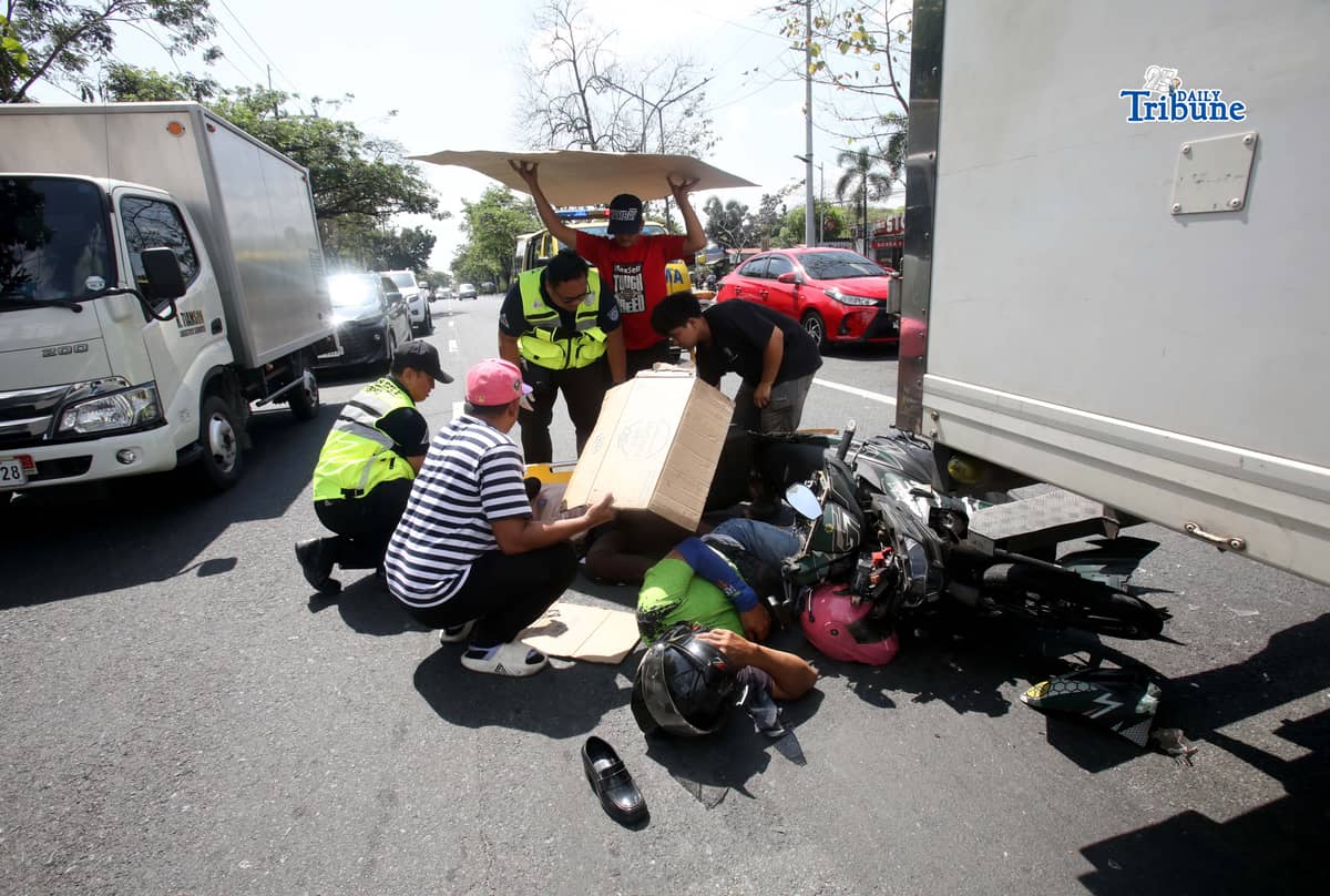 (March 11 2026) Quezon City Medics responded and rescued the accident involving a motorcycle and a closed van along Commonwealth Avenue in Quezon on Wednesday March 11 2026. Photo/Analy Labor
