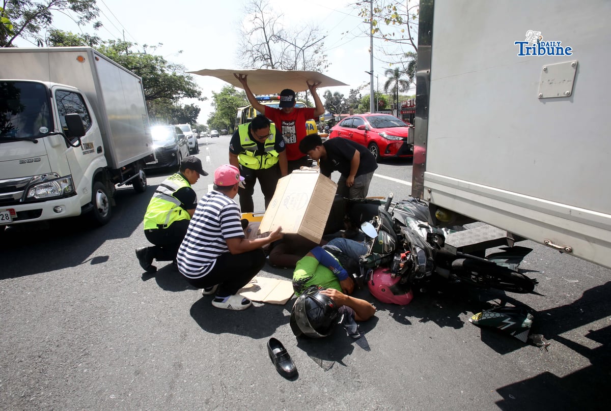 (March 11 2026) Quezon City Medics responded and rescued the accident involving a motorcycle and a closed van along Commonwealth Avenue in Quezon on Wednesday March 11 2026. Photo/Analy Labor