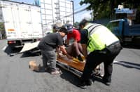 Quezon City Medics responded and rescued the accident involving a motorcycle and a closed van along Commonwealth Avenue in Quezon last March 11.