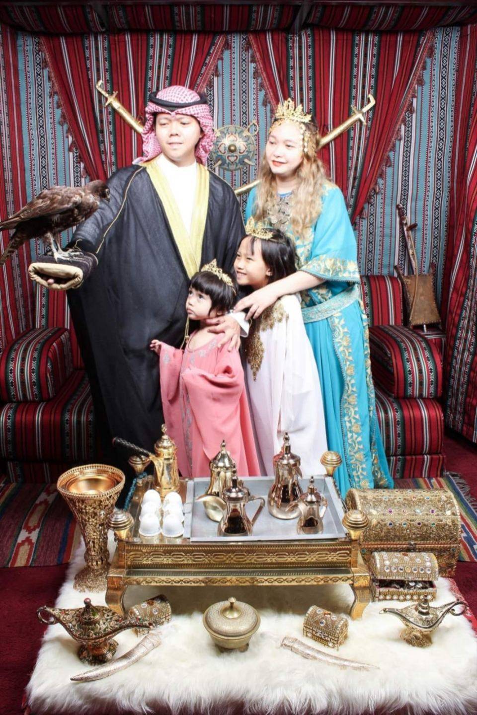 TRYING on traditional UAE costumes in Dubai Mall.