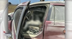 Four arrested after torched car killings