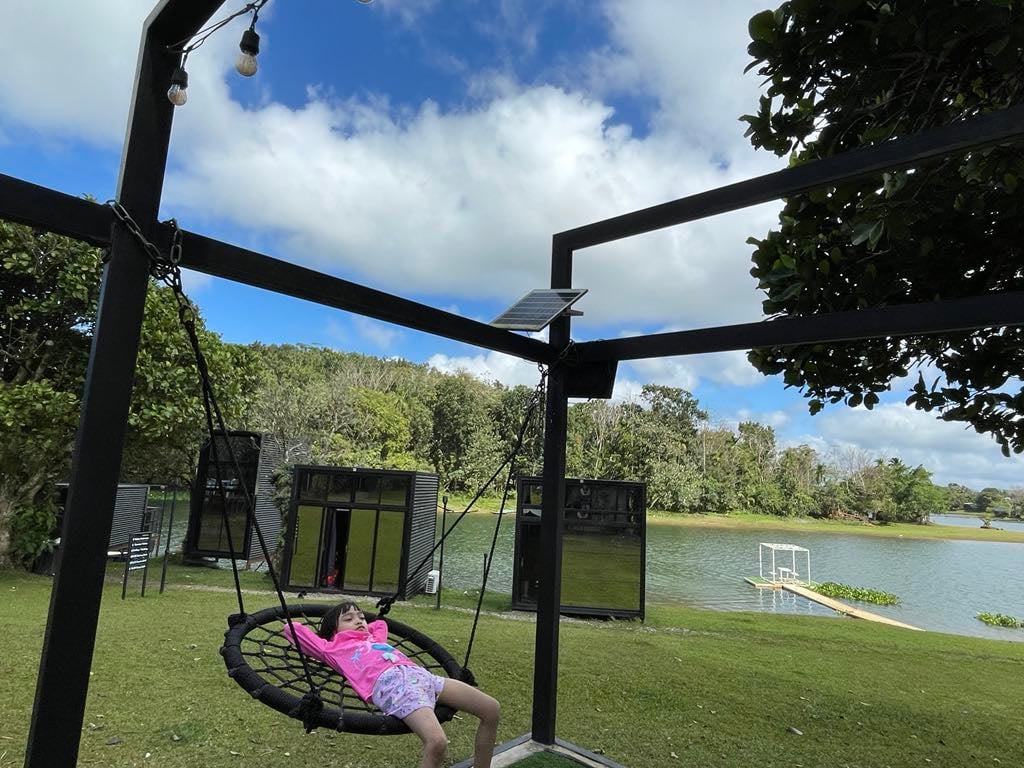 ‘THIS is the life’: Enjoying lakeside hammocks.