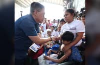 SENATOR Bong Go consoles Tondo fire victims.