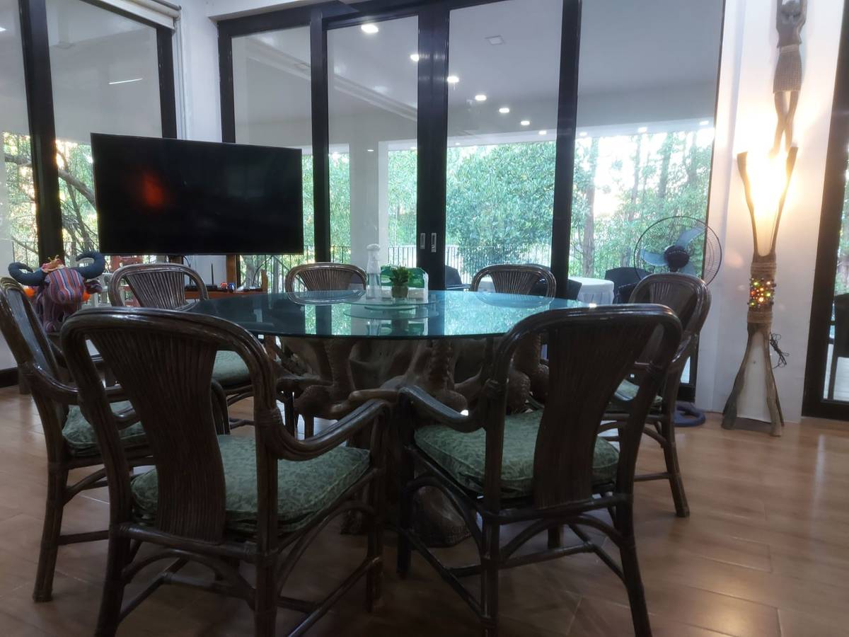 WOODEN furniture enhance the Filipino ambience.
