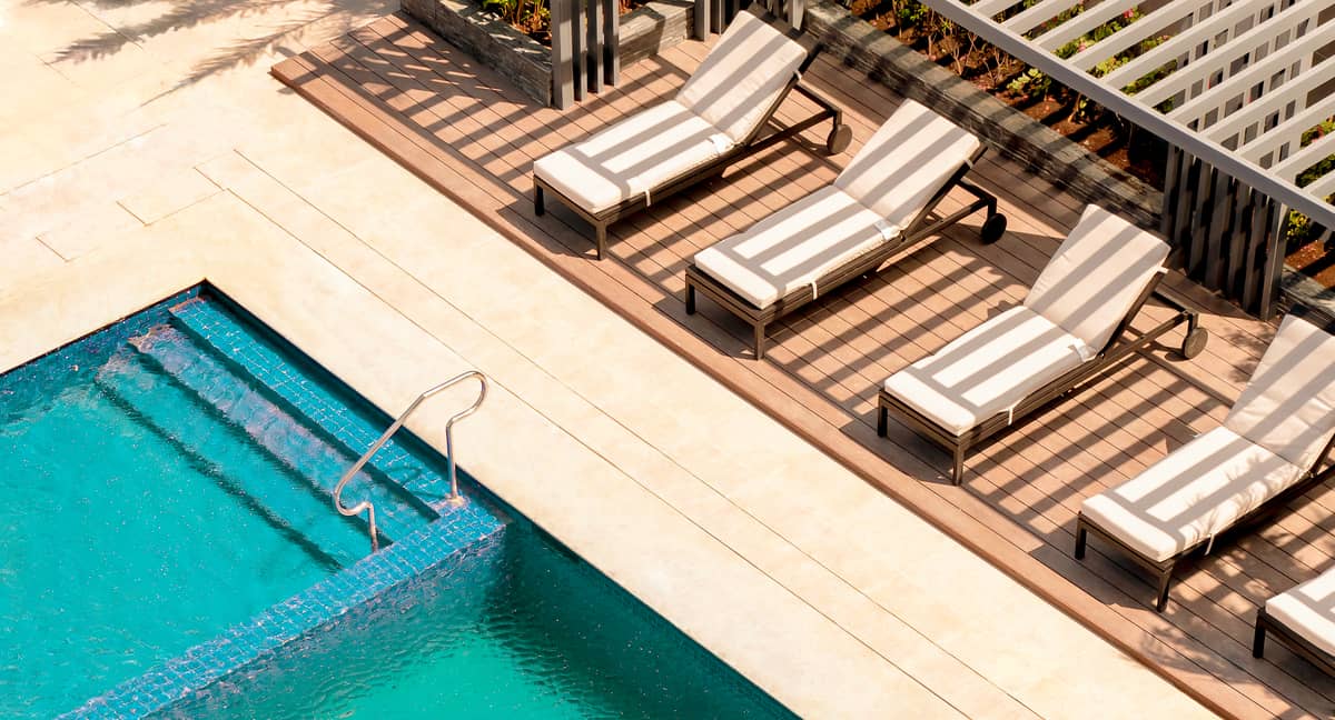 SWIMMING pool, located just adjacent to the hotel lobby and the hotel’s bar.