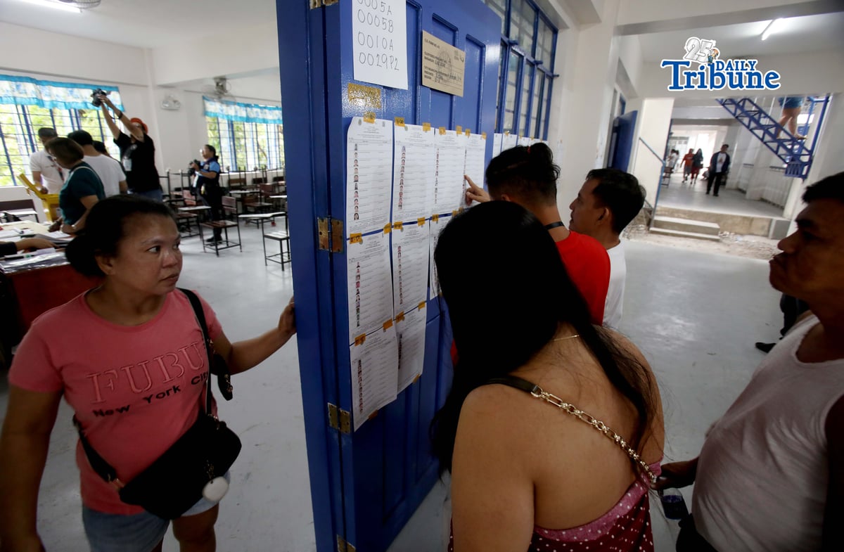 (March 14 2026) Residents check their respective precincts to cast their votes for the special election for Antipolo’s 2nd congressional district, fill the district’s vacant seat in the House of Representative for the remainder of the 20th congress, after Romeo Acop the incumbent, died on December 20 2025, held at the San Jose National High School in Antipolo City, Rizal on Saturday, March 14, 2026. Photo/Analy Labor