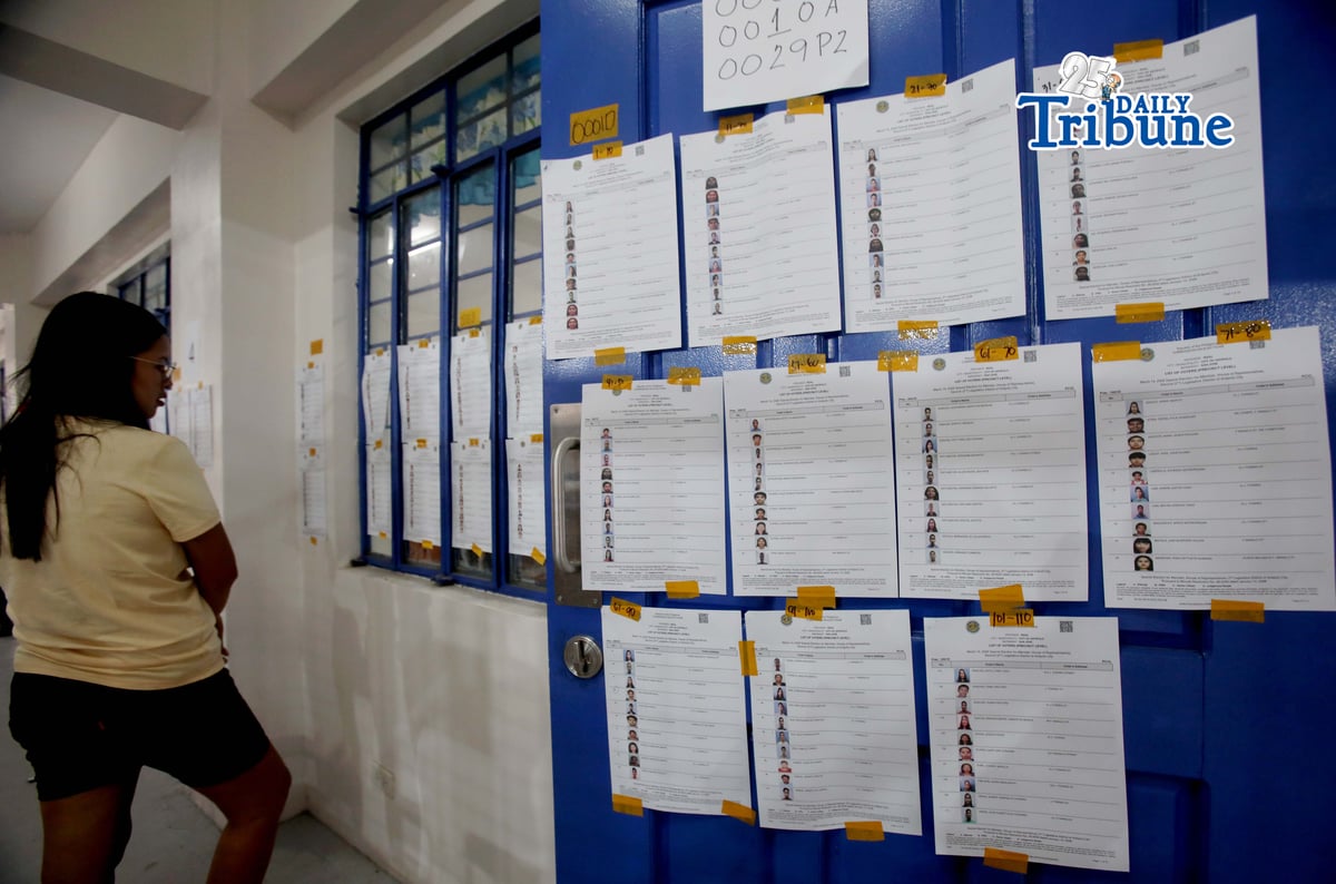 (March 14 2026) Residents check their respective precincts to cast their votes for the special election for Antipolo’s 2nd congressional district, fill the district’s vacant seat in the House of Representative for the remainder of the 20th congress, after Romeo Acop the incumbent, died on December 20 2025, held at the San Jose National High School in Antipolo City, Rizal on Saturday, March 14, 2026. Photo/Analy Labor