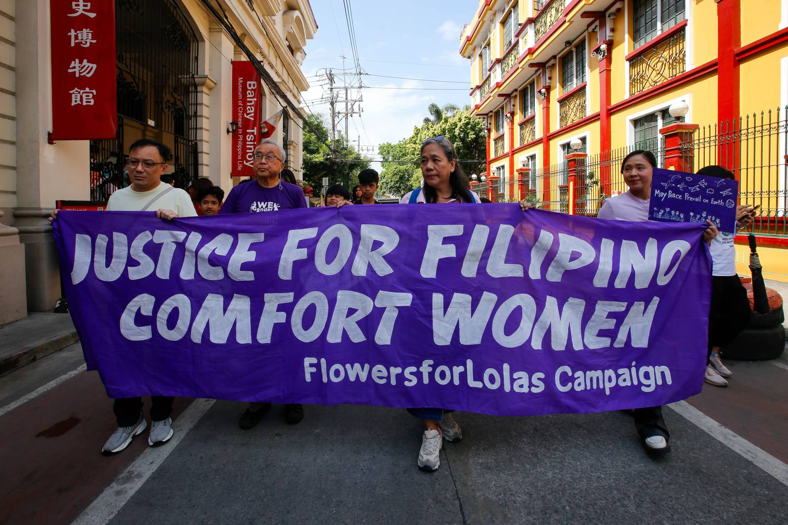 Women's rights advocates from Lila Filipina, Flowers for the Lolas, and Gabriela Women's Party march through Intramuros, Manila on  15 March 2026. Alongside descendants of Filipina "comfort women," they demand justice for atrocities committed during the Japanese occupation. The Walled City, once a garrison for the Japanese Imperial Army, stands as a silent witness to the hundreds of Filipinas who endured abuse within its walls.

The group also condemns the expanded US-Israel wars of aggression in West Asia and Latin America and stands with the women and children targeted by global conflict.