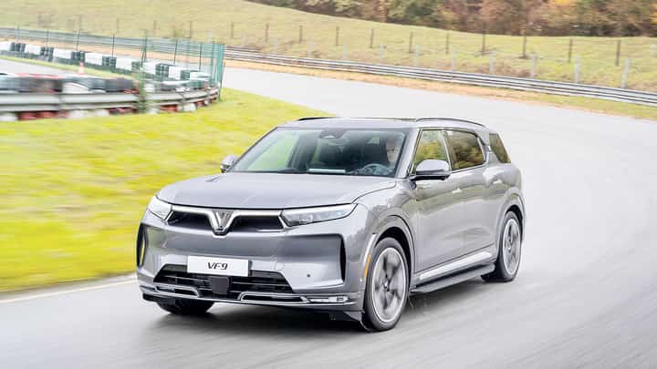 LARGER VinFast VF9 highlights the company’s electric SUV lineup offered with battery subscription options that spread battery costs through monthly payments.