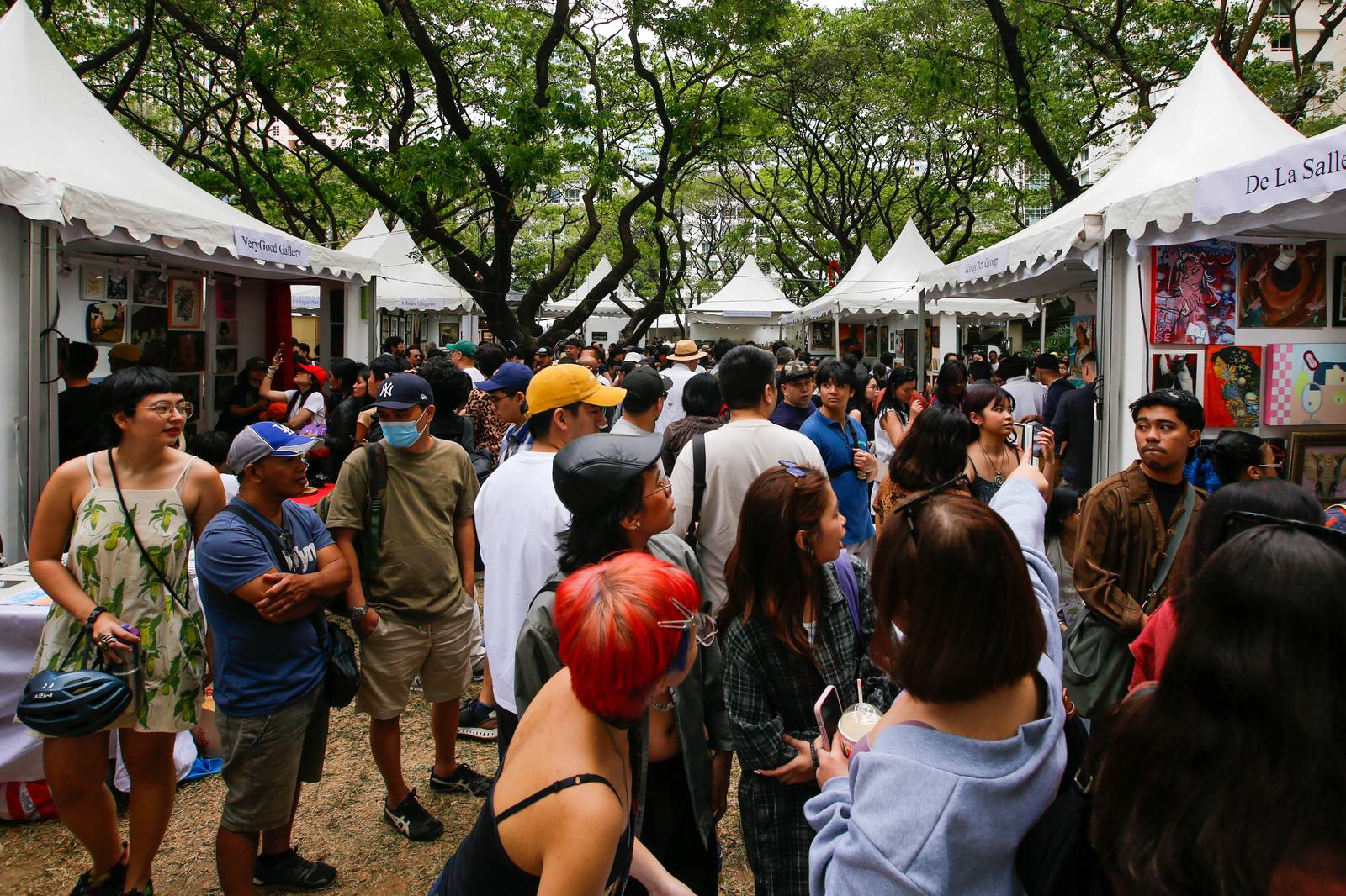 Art enthusiasts, collectors, and artists converge at Jaime Velasquez Park in Makati City on 15 March 2026, for the 20th anniversary of Art in the Park. The annual one-day event features dozens of exhibitors and thousands of affordable pieces, continuing a two-decade mission to democratize the local creative scene.