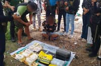 MEMBERS of the Philippine Coast Guard present the seized suspected shabu weighing seven kilograms and worth at least P47.6 million following a joint maritime operation in the vicinity waters off Barangay Sibutu, Tawi-Tawi.