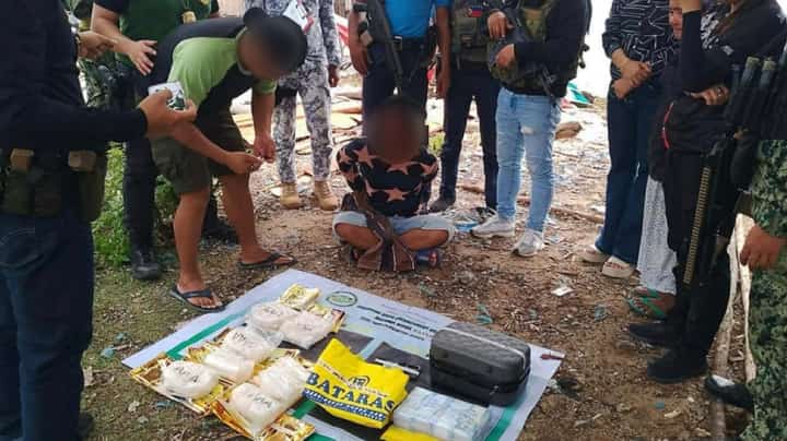 MEMBERS of the Philippine Coast Guard present the seized suspected shabu weighing seven kilograms and worth at least P47.6 million following a joint maritime operation in the vicinity waters off Barangay Sibutu, Tawi-Tawi.
