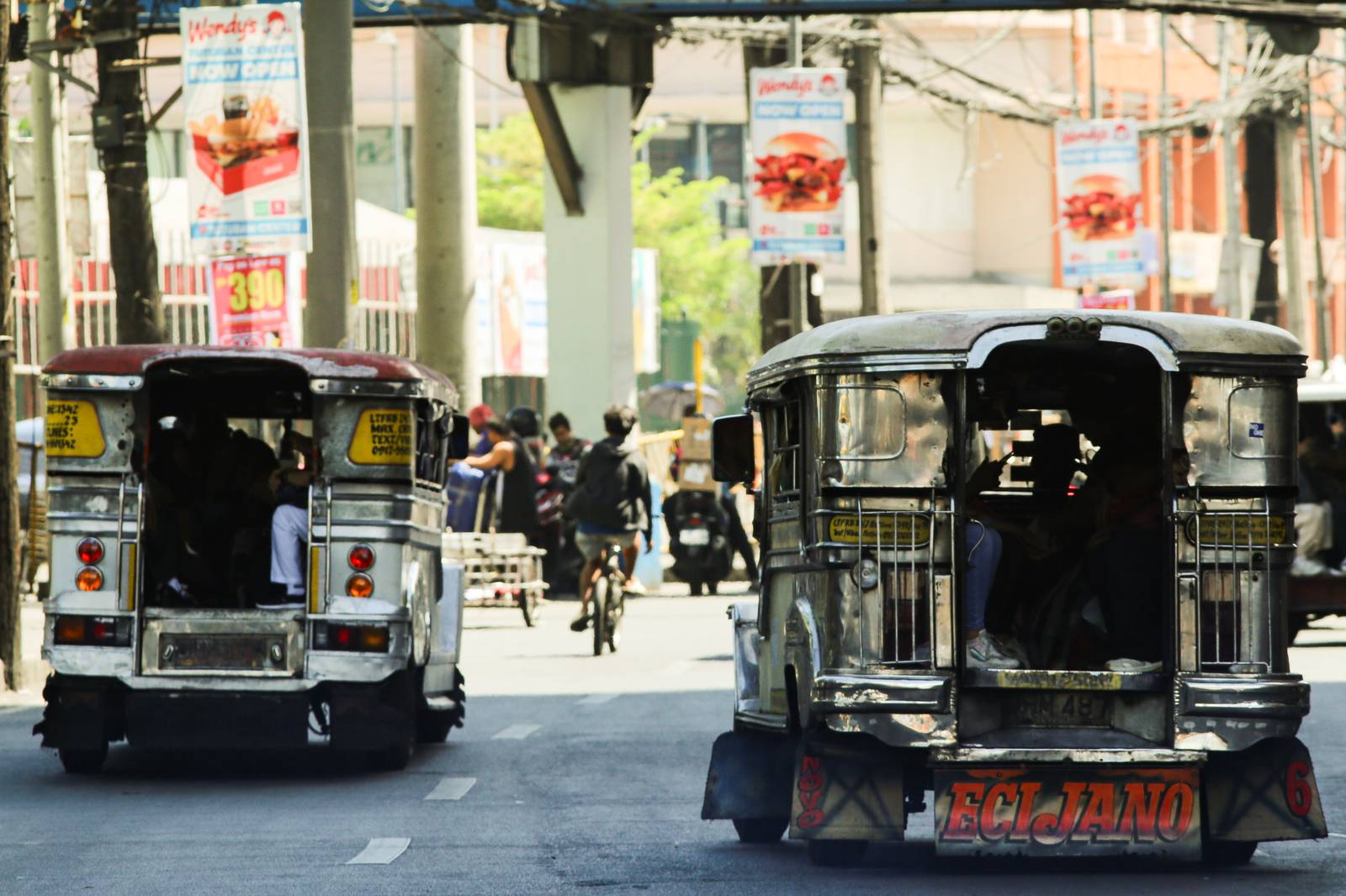 Public Utility Jeepneys (PUJs) ply their route at Recto Avenue in Manila on 16 March 2026. The Land Transportation Franchising and Regulatory Board (LTFRB) recently approved a fare hike in Metro Manila to assist drivers struggling with surging fuel costs, as diesel prices are projected to exceed P100 per liter this week.