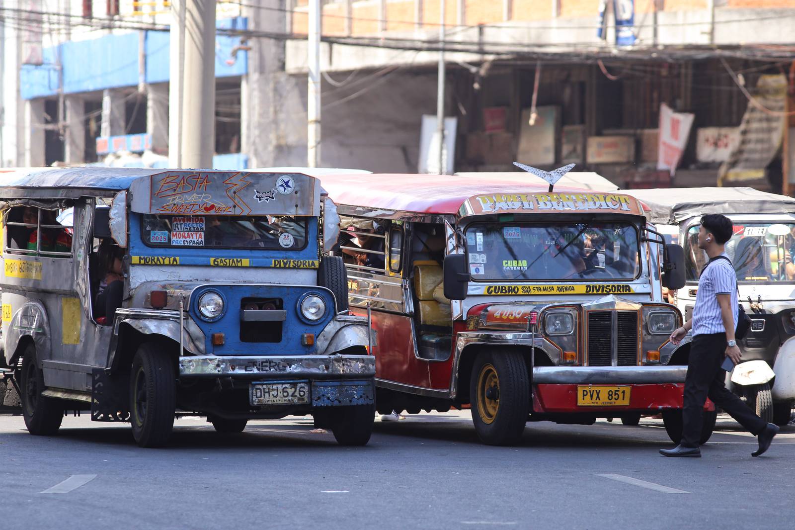 Public Utility Jeepneys (PUJs) ply their route at Recto Avenue in Manila on 16 March 2026. The Land Transportation Franchising and Regulatory Board (LTFRB) recently approved a fare hike in Metro Manila to assist drivers struggling with surging fuel costs, as diesel prices are projected to exceed P100 per liter this week.