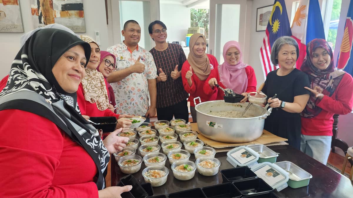 STAFF and members of Perwakilan of the Embassy of Malaysia in Manila prepare Bubur Lambuk, a traditional Malaysian rice porridge shared during Ramadan, at the Ambassador’s Residence.