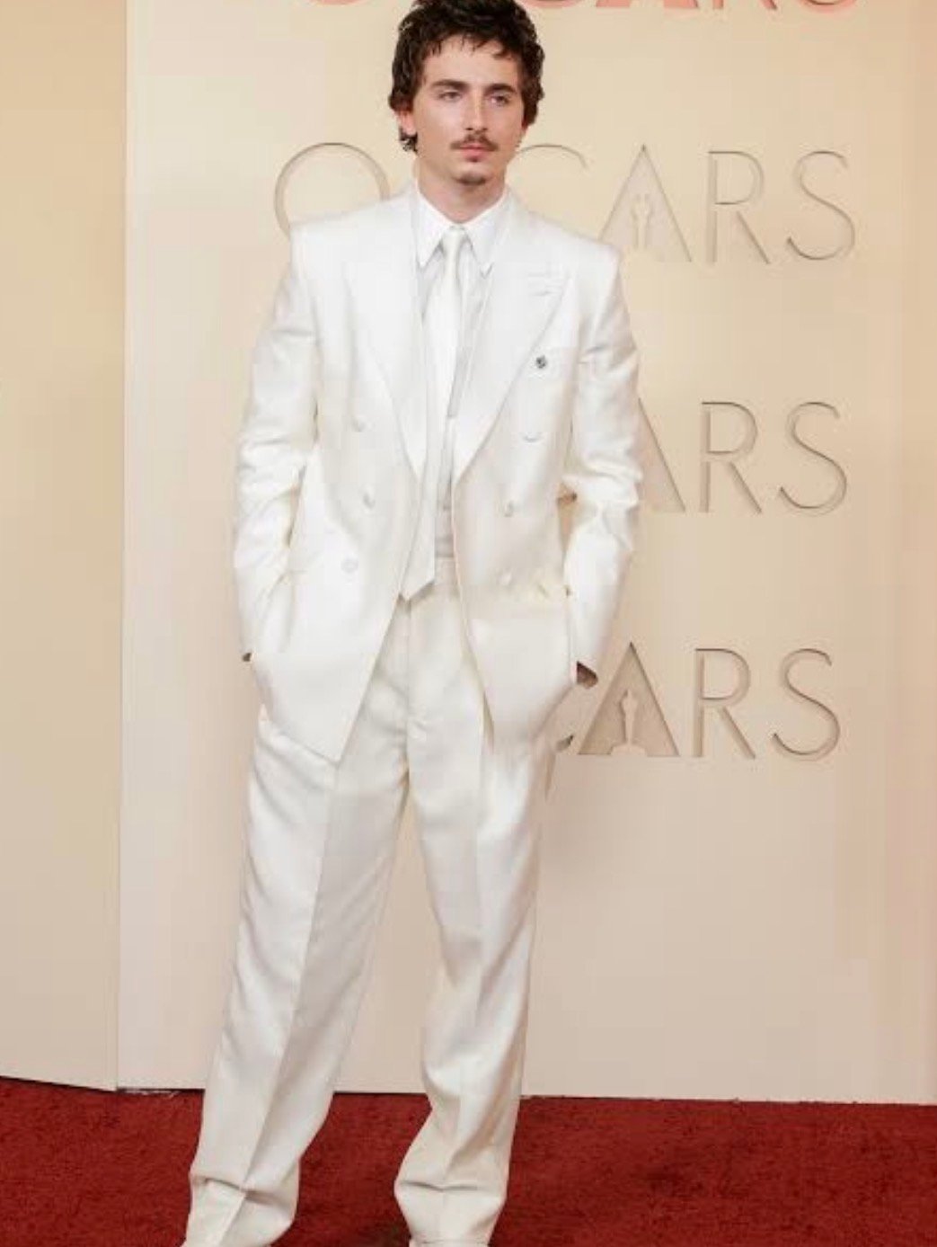 Chalamet turns heads in white suit at Oscars amid ballet debate