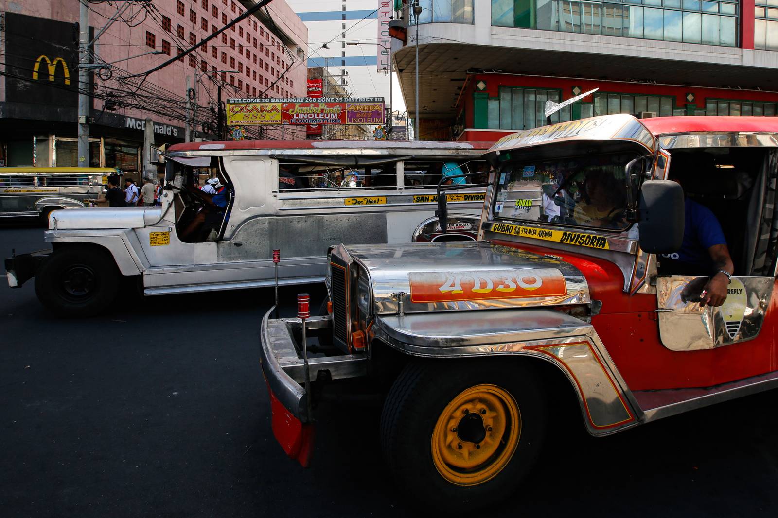 Public Utility Jeepneys (PUJs) ply their route at Recto Avenue in Manila on 16 March 2026. The Land Transportation Franchising and Regulatory Board (LTFRB) recently approved a fare hike in Metro Manila to assist drivers struggling with surging fuel costs, as diesel prices are projected to exceed P100 per liter this week.