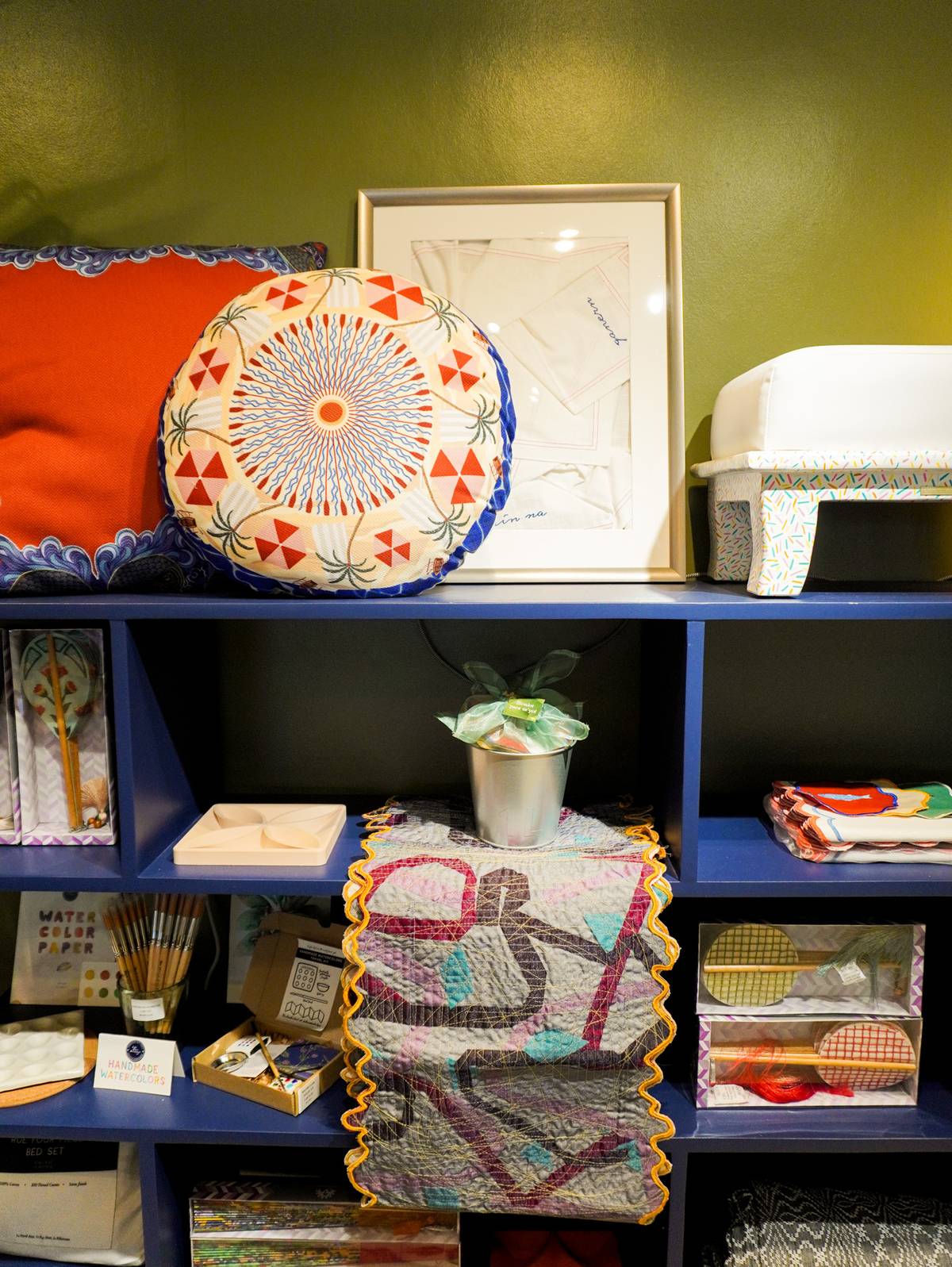 THE display featuring Casa Mercedes, Ottoman Collection, The Olive Tree, Life After Breakfast