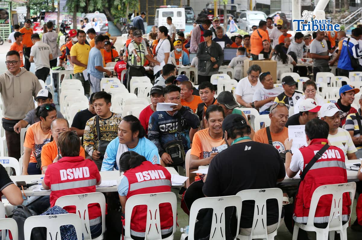 (March 18 2026) Tricycle drivers queue for fuel aid from the national government during the 2nd day of releasing at the SB Park in Batasan Hills, Quezon City on Wednesday, March 18, 2026. Photo/Analy Labor