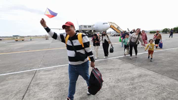 A total of 317 Filipinos who safely returned to the country aboard the third government-chartered flight on Thursday at the Villamor Airbase in Pasay City.