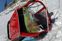 A GONDOLA lays on the snow after it detached and crashed, rolling several times in Titlis-Engelberg ski area in Engelberg, central Switzerland, as strong winds were reported in the area, on 18 March 2026.