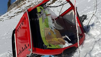 A GONDOLA lays on the snow after it detached and crashed, rolling several times in Titlis-Engelberg ski area in Engelberg, central Switzerland, as strong winds were reported in the area, on 18 March 2026.