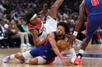 CADE Cunningham of the Detroit Pistons dives for a loose ball that prompted him to suffer a collapsed lung in the first quarter of their 130-117 win over the Washington Wizards in the NBA regular season.